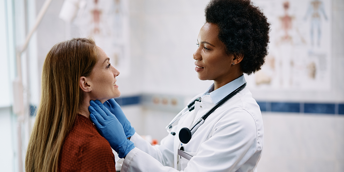 Landing-Page-Images-thyroid-exam doctor giving female patient a thyroid exam